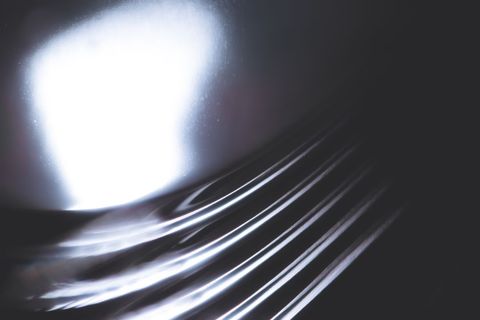 Futuristic Metallic Abstract with Reflections and Shadows