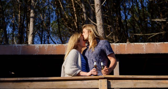 Couple Enjoying Outdoors and Beer on Balcony - Download Free Stock Images Pikwizard.com