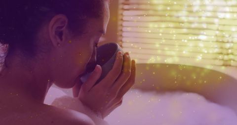 Tranquil Woman Enjoying Coffee in Bubble Bath with Warm Light Spots
