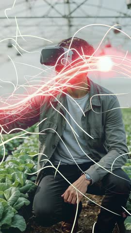 Man Activating VR Headset Selecting Nodes Analyzing Greenhouse Crops Vertical Video