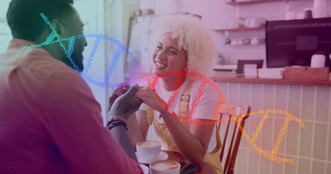 Couple Hands Amidst DNA Helix Overlay in Artistic Cafe Setting