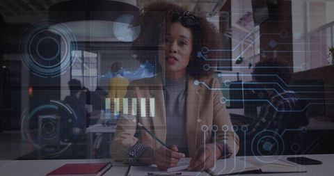 Black woman presenting virtual analytics in modern open office with holographic UI overlay