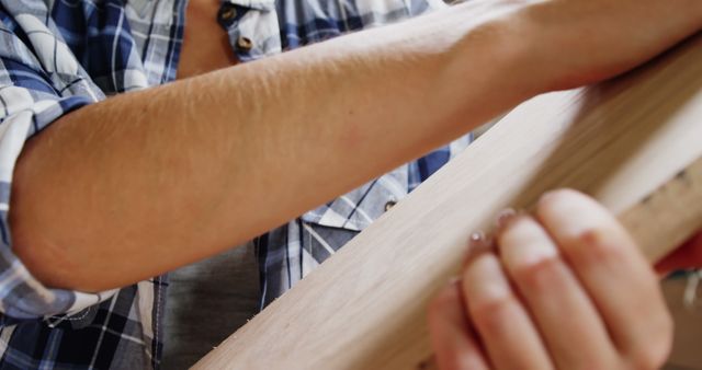 Close-Up of Carpenter Sanding Wooden Board - Download Free Stock Images Pikwizard.com