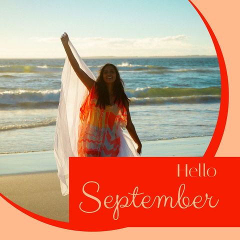 Joyful celebration on beach with 'hello september' theme