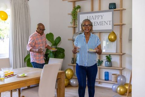 African American Senior Couple Celebrates Retirement with Joy