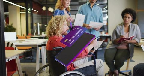 Disabled Worker Discussing Projects in Inclusive Modern Office Setting