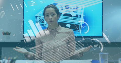 Businesswoman analyzing financial data in modern tech office