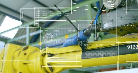 Yellow robotic arm with hud overlays and braided blue cable for industrial automation