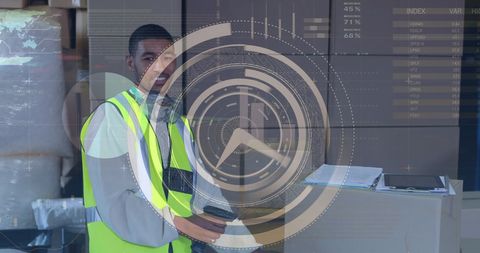 Warehouse worker using technology for box scanning