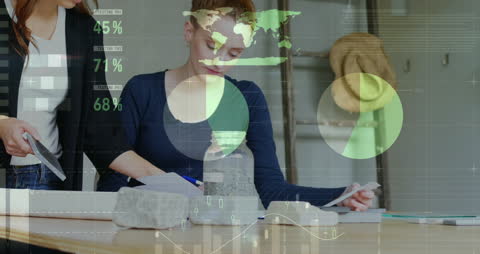 Business Team Analyzing Financial Data at Office Desk