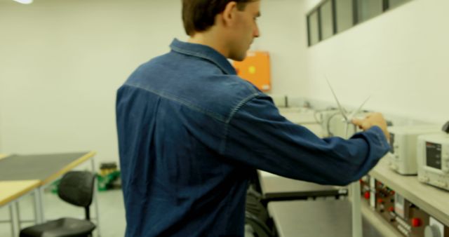 Technician Calibrating Technical Devices in Laboratory - Download Free Stock Images Pikwizard.com