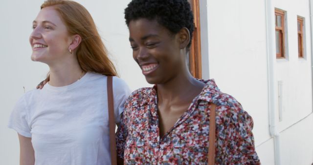 Friends Laughing While Walking Outdoors - Download Free Stock Images Pikwizard.com