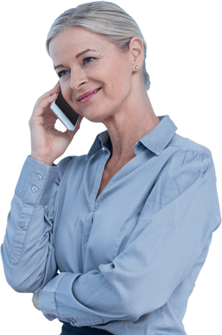 Smiling mature businesswoman on phone call wearing formal shirt