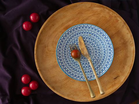 Rustic Dinning Set with Blue Patterned Plate and Cherry Tomato