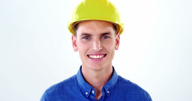 Smiling Male Construction Worker Wearing Safety Helmet - Download Free Stock Images Pikwizard.com