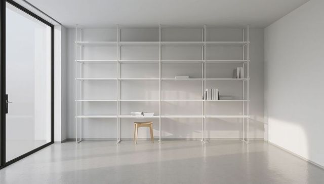 Minimalist White Wall Shelving with Wooden Stool and Glass Door in Sunlit Modern Studio