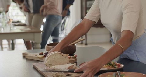 Friends Sharing Meal and Enjoying Quality Time Together in Cozy Setting