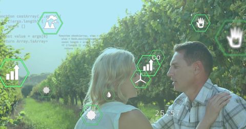 Couple in Vineyard with Digital Ecology Interface Overlay