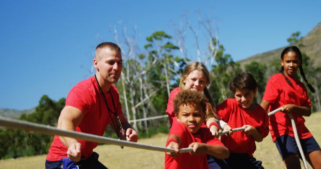 Team Building Activity with Children Pulling Rope Outdoors - Download Free Stock Images Pikwizard.com