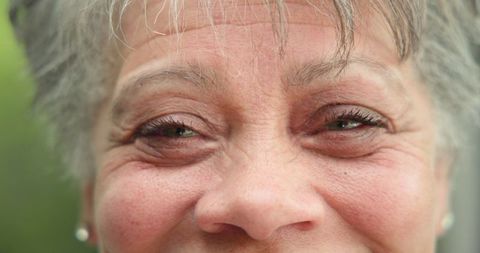 Senior Woman Radiating Elegance with Natural Beauty Outdoors