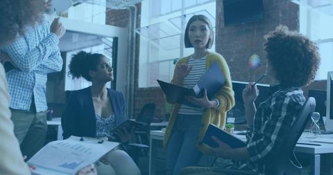Diverse Team Collaborating in Modern Office Loft