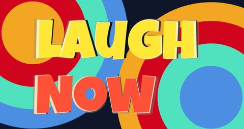 Laugh now sign with bold colorful circles on black background
