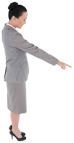 Caucasian businesswoman pointing downwards in elegant suit on transparent background