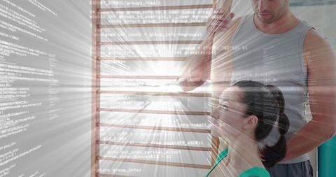 Trainer guiding stretch with digital code overlay