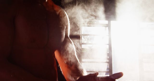 Fit Man Preparing for Workout with Chalked Hands at Gym - Download Free Stock Images Pikwizard.com