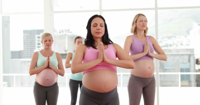 Pregnant Women Practicing Yoga Group Relaxation Exercise - Download Free Stock Images Pikwizard.com