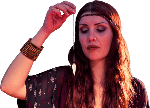 fortune teller using pendulum in mystical setting, focused and transparent - Download Free Stock Videos Pikwizard.com