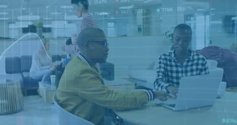 Diverse Team Discussing Financial Data and Modern Business Solutions