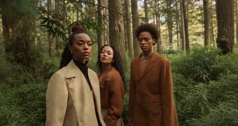 Models Exhibiting Elegance and Sophistication in Sunlit Forest