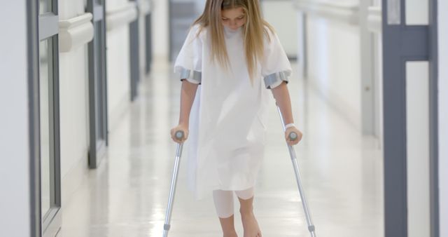 Girl Recovering in Hospital with Crutches - Download Free Stock Images Pikwizard.com