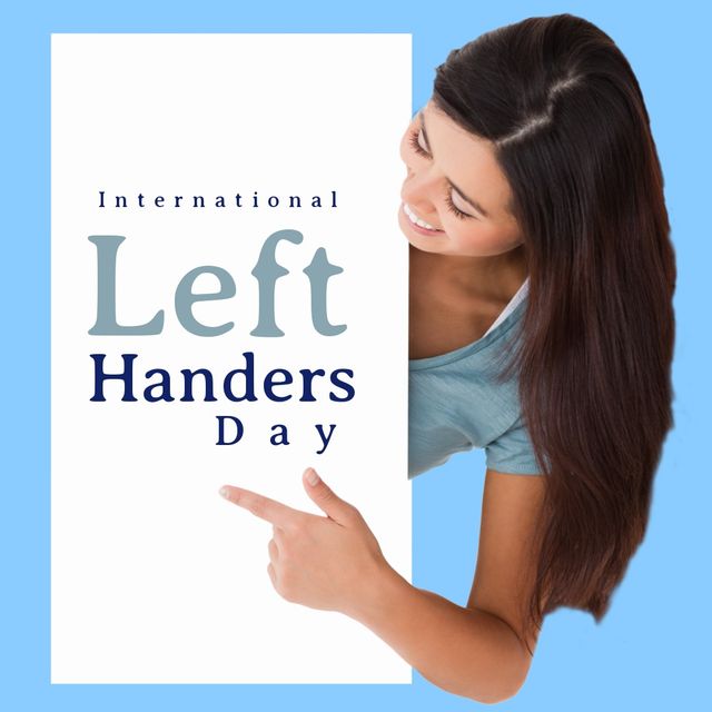 Asian woman celebrating International Left Handers Day, pointing to text with cheerful expression. Ideal for promotions, awareness campaigns, social media posts, blog articles, and educational materials related to left-handedness.