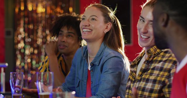 Group of Friends Laughing and Talking at Bar, Having Fun, Socializing - Download Free Stock Images Pikwizard.com