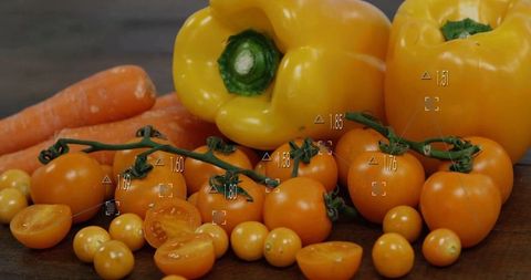 Yellow bell peppers and carrots with cherry tomatoes for farm fresh nutrition