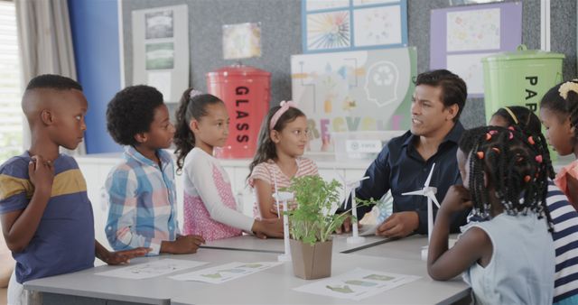 Teacher Explaining Renewable Energy to Enthusiastic Children in Classroom - Download Free Stock Images Pikwizard.com