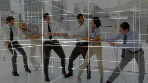 Business Team Engaged in Enthusiastic Office Tug of War