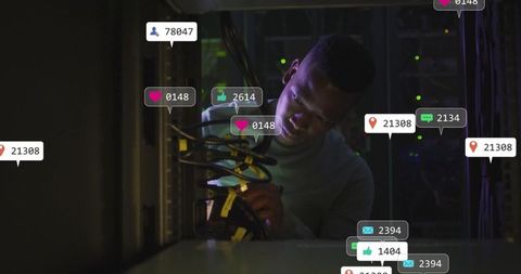 Technician optimizing server with digital connectivity icons