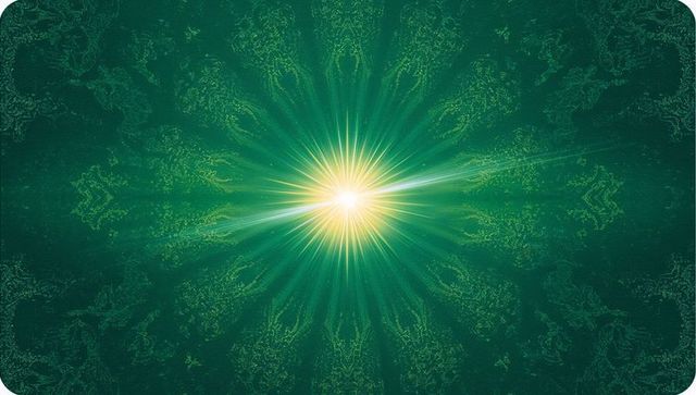 Radiating emerald core with golden starburst and fractal mandala ornament