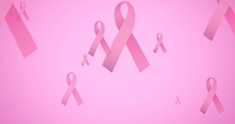 Pink Breast Cancer Awareness Ribbons on Pink Background