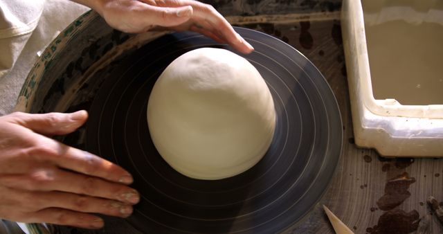 Hands Shaping Wet Clay on Pottery Wheel - Download Free Stock Images Pikwizard.com