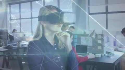Woman Using VR for Data Analysis with Holographic Interface