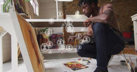 Artist Painting in Studio with Digital Connections Overlay