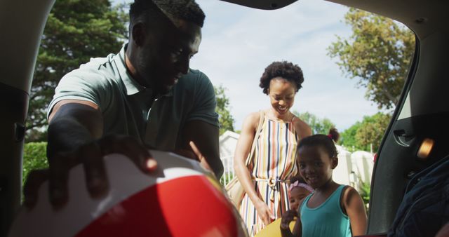 Happy African American Family Packing Car for Summer Vacation - Download Free Stock Images Pikwizard.com