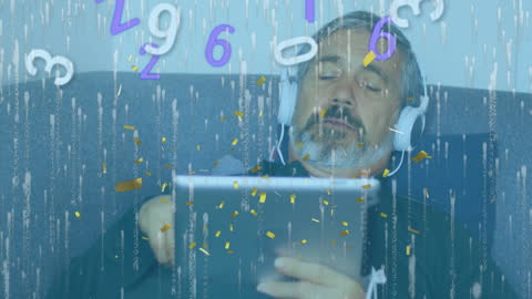 Man Using Tablet with Data and Confetti Animations