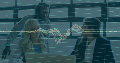 Business Team Analyzing Interactive Multi-Line Analytics Chart in Modern Office