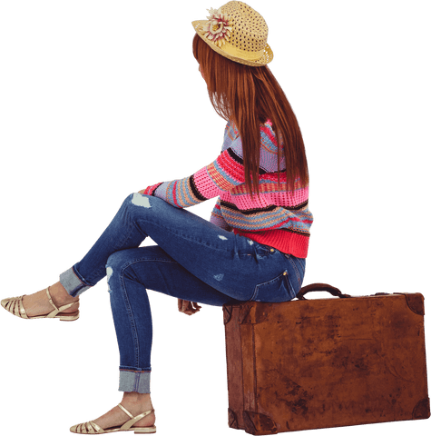 Hipster Woman in Vibrant Sweater Resting on Transparent Vintage Suitcase