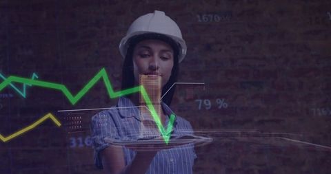 Woman engineer wearing hard hat holding augmented reality building model with data overlay